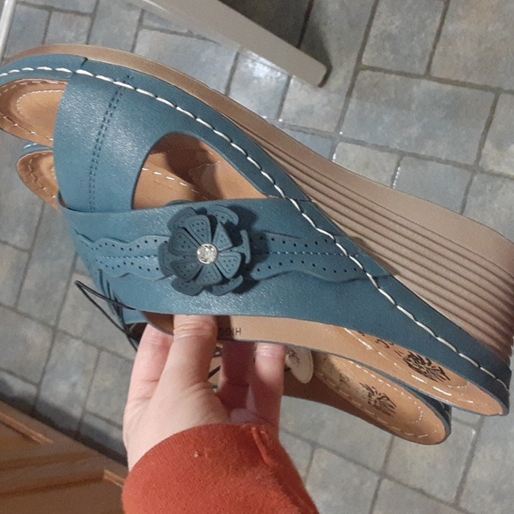 G.C. Shoes. Shoes - G.C. shoes. Blue sandals with flowers. New with tags.
